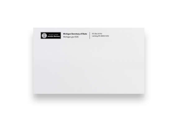 A white envelope from the Michigan Secretary of State, featuring an official logo and address window in the top left corner, with Michigan.gov/SOS and a Lansing, MI return address.