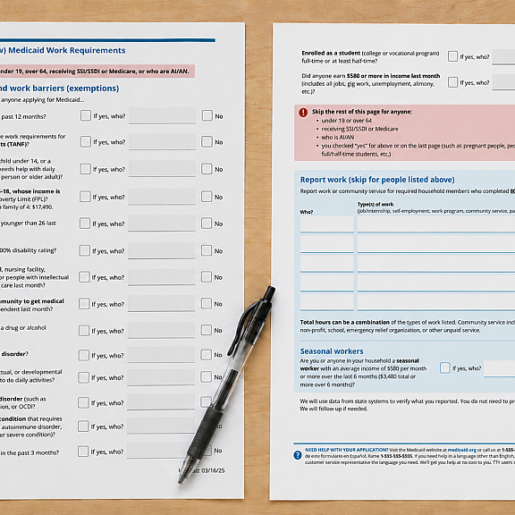 Two Medicaid paperwork forms with checkboxes and fill-in sections are laid out on a wooden surface. A black pen is placed diagonally across the left form. The forms request household and work details.